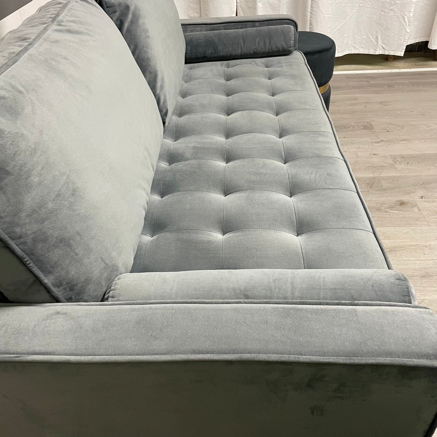 Grey velvet sofa