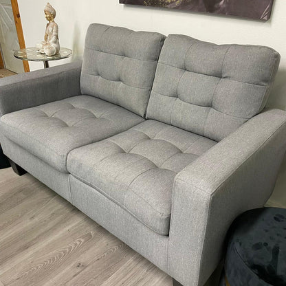 Grey two-seater sofa – Modern and compact style