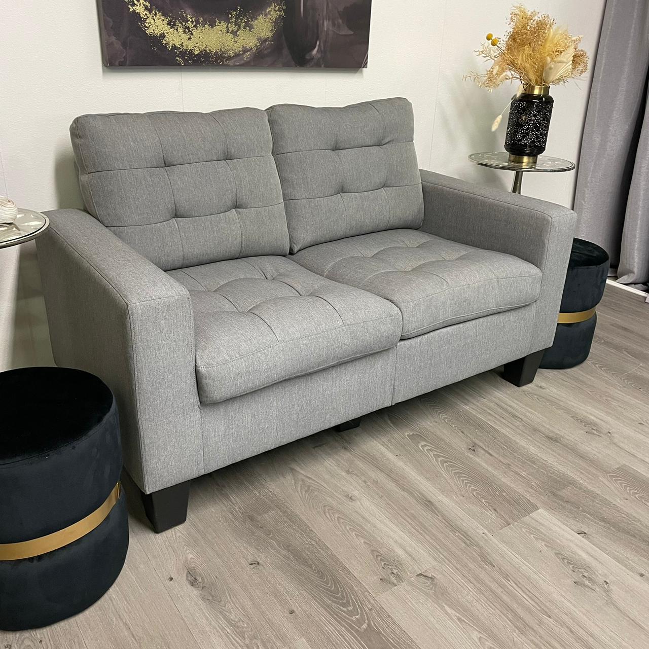 Grey two-seater sofa – Modern and compact style