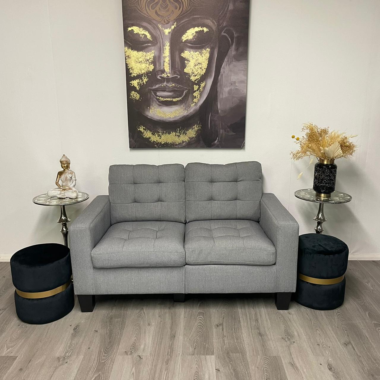 Grey two-seater sofa – Modern and compact style