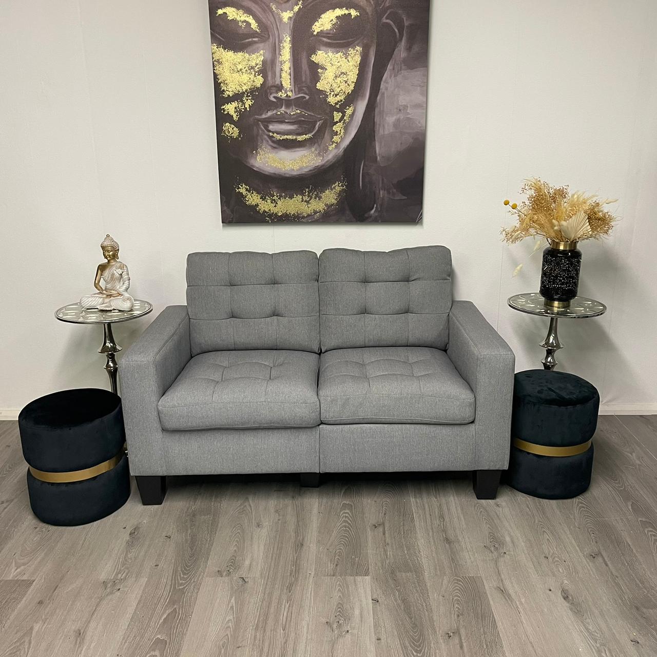 Grey two-seater sofa – Modern and compact style